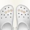 Colgante Jibbitz para zapatos con la letra X dorada