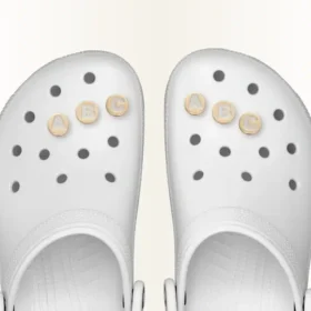 Colgante Jibbitz para zapatos con la letra X dorada