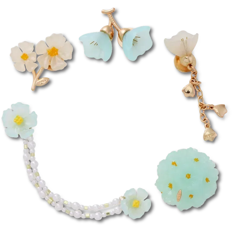 Paquete de 5 colgantes Jibbitz con delicado estampado floral azul Paquete de 5 colgantes Jibbitz con delicado estampado floral azul