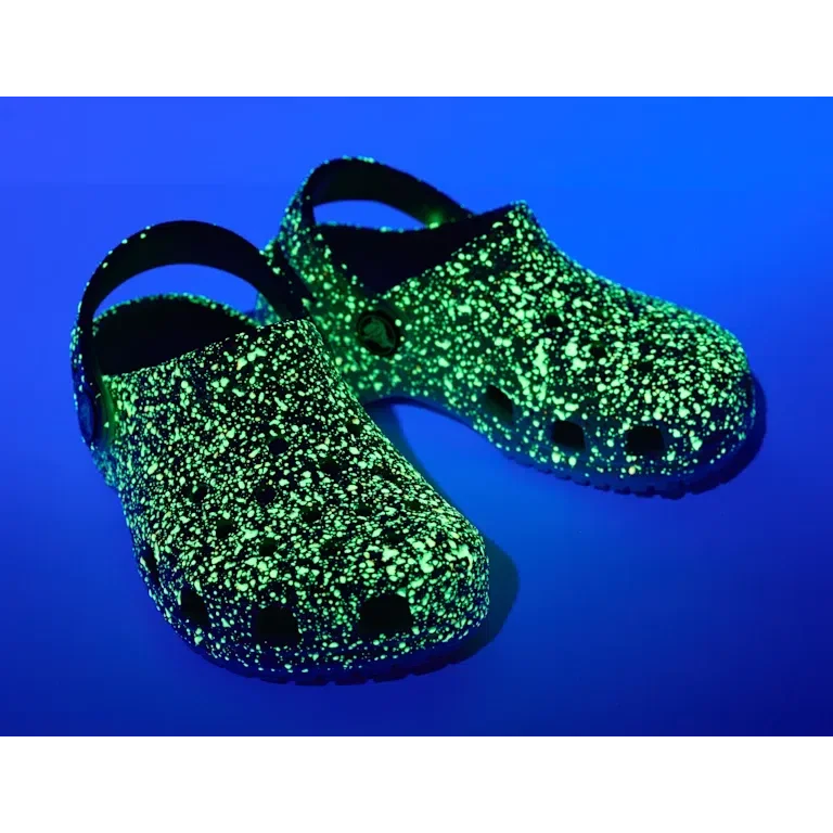 Zuecos Classic Glow Paint Splatter para niños Zuecos Classic Glow Paint Splatter para niños